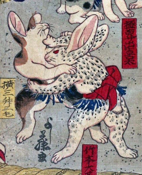 A print of rabbits fighting.
